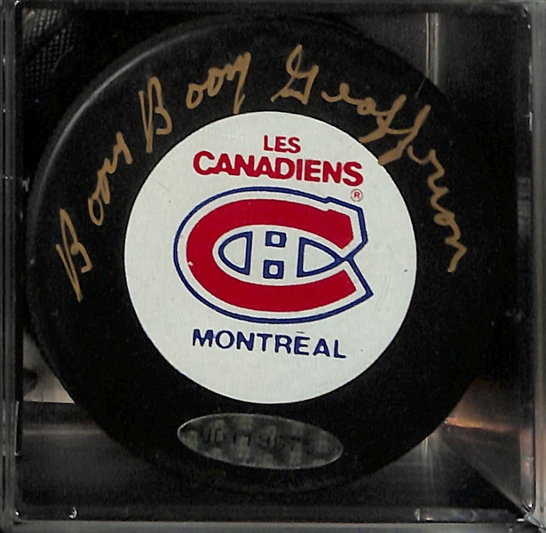 Lot of (4)  Signed Hockey Pucks- Denis Savard (HOF), Boom Boom Bernie Geoffrion (HOF), Guy Lapointe (HOF), Mike Eruzione (JSA COA) - JSA Auction Letter