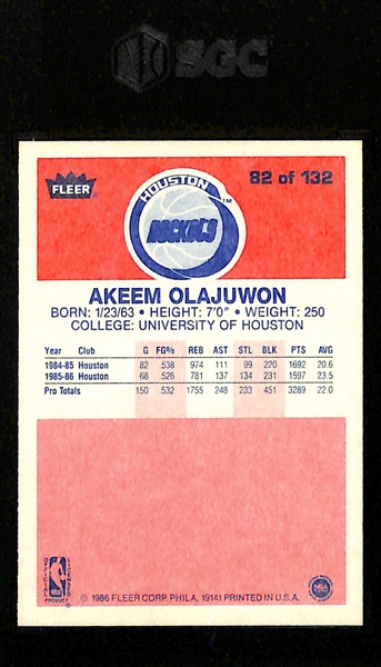 1986-87 Fleer Basketball Hakeem Olajuwon #82 Rookie Card Graded SGC 8.5