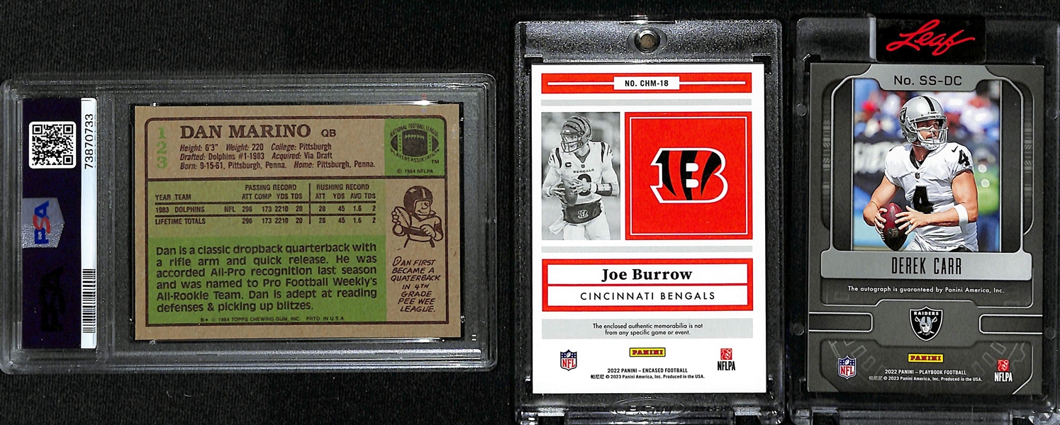 Football QB Lot - 1984 Topps Dan Marino Rookie (PSA 8), 2022 Encased Joe Burrow Jersey Card #ed/99, & 2022 Playbook Derek Carr Autographed Card #ed/10