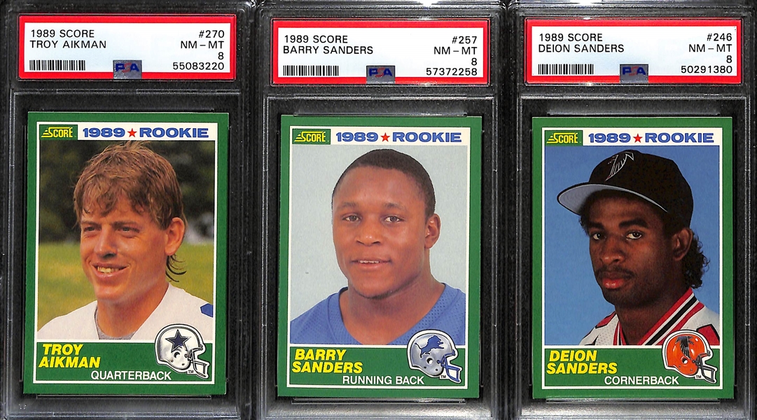 Lot of (3) 1989 PSA 8 Rookie Cards - Inc. Troy Aikmen, Barry Sanders, & Deion Sanders. 