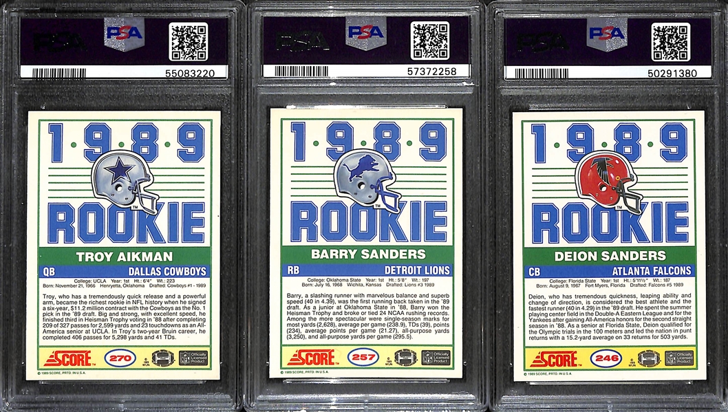 Lot of (3) 1989 PSA 8 Rookie Cards - Inc. Troy Aikmen, Barry Sanders, & Deion Sanders. 