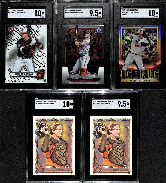 Lot of (9) SGC Graded 2023 Baltimore Orioles Rookies inc. Bowman Chrome Adley Rutschman Iconic Atomic (SGC 9.5) (#/150), Topps Chrome Cosmic DL Hall Autograph Orange (SGC 10) (10 Auto) (#/25),+