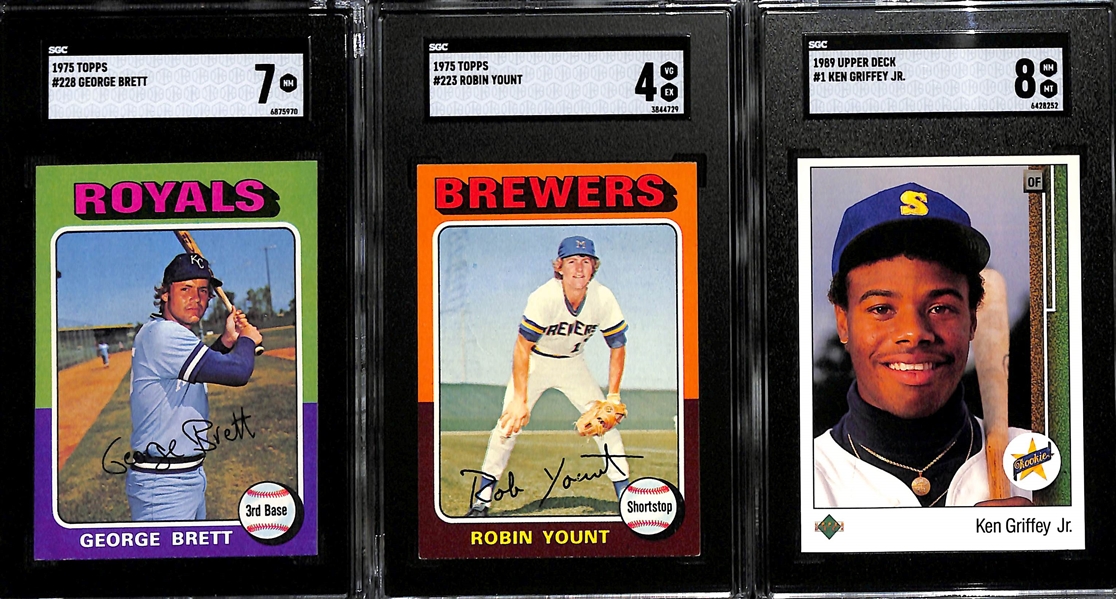 Rookie Lot - 1975 Topps George Brett (SGC 7), 1975 Topps Robin Yount (SGC 4), 1989 Upper Deck Ken Griffey Jr. (SGC 8)