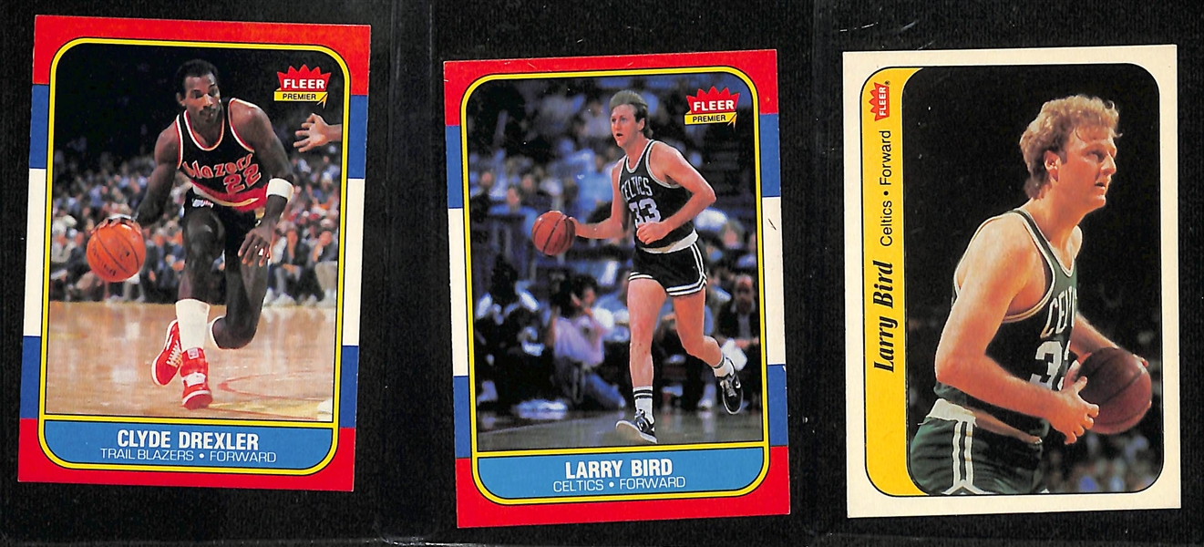 Lot of (24) 1986-1997 Basketball Cards inc. 1986-87 Fleer Clyde Drexler Rookie, 1986-87 Fleer Larry Bird, 1986-87 Fleer Larry Bird Sticker, +