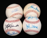 Lot of (4) Autographed Philadelphia Phillies Signed Baseballs w. 2 multi-signed baseballs by Mike Schmidt, Pete Rose, & Larry Bowa (Beckett BAS Reviewed)
