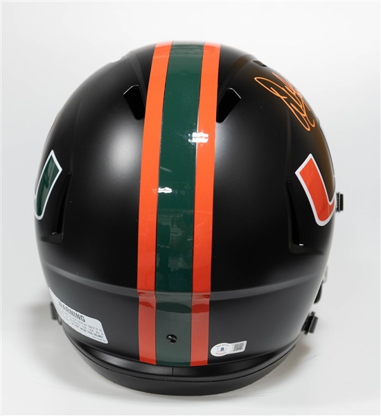 Warren Sapp Autographed/Signed Full Size Miami Hurricane Replica Riddell Helmet - Beckett/BAS Witnessed Sticker of Authenticity!