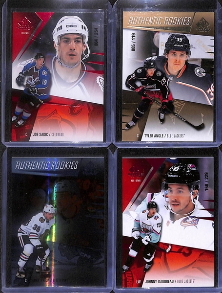 Lot of (34) 2023-24 SP Game Used Hockey Cards including (5) Autographs- Jordan Eberle, Jake Sanderson Patch, Billy Sweezey Patch Rookie (#/25), and more