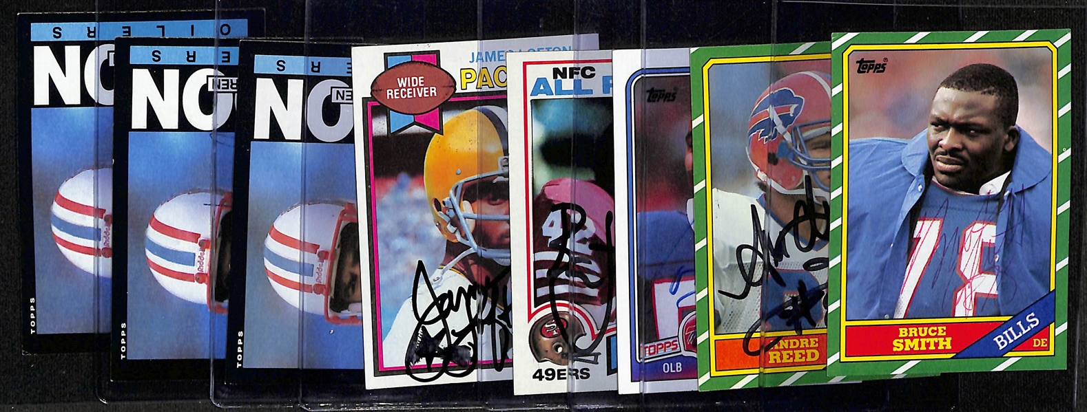 Lot of (8) Signed 1970s-1980s Football Cards- (3) Warren Moon, James Lofton Rookie, Ronnie Lott Rookie, Cornelius Bennett, Andre Reed Rookie, Bruce Smith Rookie  (Beckett BAS Reviewed)