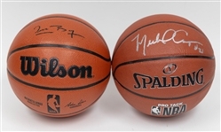 Lot of (2) Autographed/Signed Full Size Authentic Basketballs inc. Michael Cooper & Mugsey Bogues w. JSA COA!