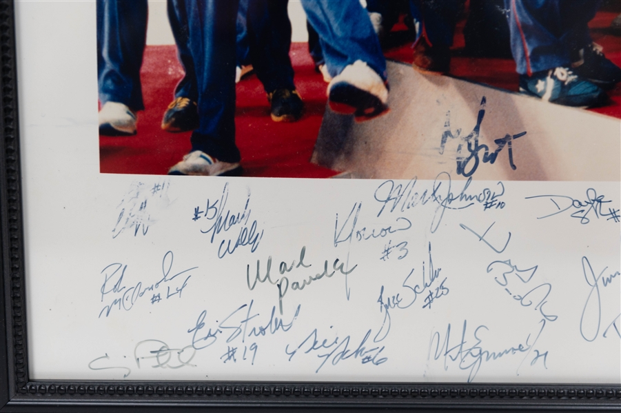 1980 USA Olympic Hockey Team Signed 16x20 Framed Gold Medal Podium Ceremony Team Picture (+JSA Auction Letter)