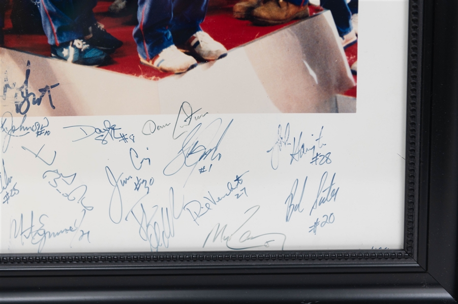 1980 USA Olympic Hockey Team Signed 16x20 Framed Gold Medal Podium Ceremony Team Picture (+JSA Auction Letter)