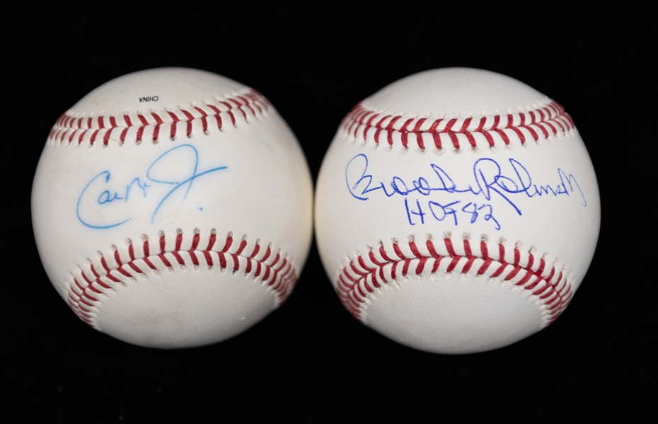 (2) Signed Baseballs w. Cal Ripken Jr (JSA Sticker) & Brooks Robinson (JSA Auction Letter)