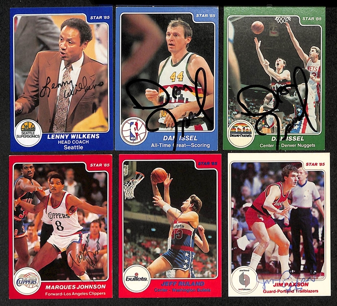 Lot of (20+) Signed 1984-85 Star Basketball Cards inc. Lenny Wilkens, (2) Dan Issel, Marques Johnson, Jeff Ruland, + (JSA Auction Letter)