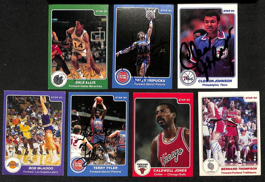 Lot of (20+) Signed 1984-85 Star Basketball Cards inc. Lenny Wilkens, (2) Dan Issel, Marques Johnson, Jeff Ruland, + (JSA Auction Letter)