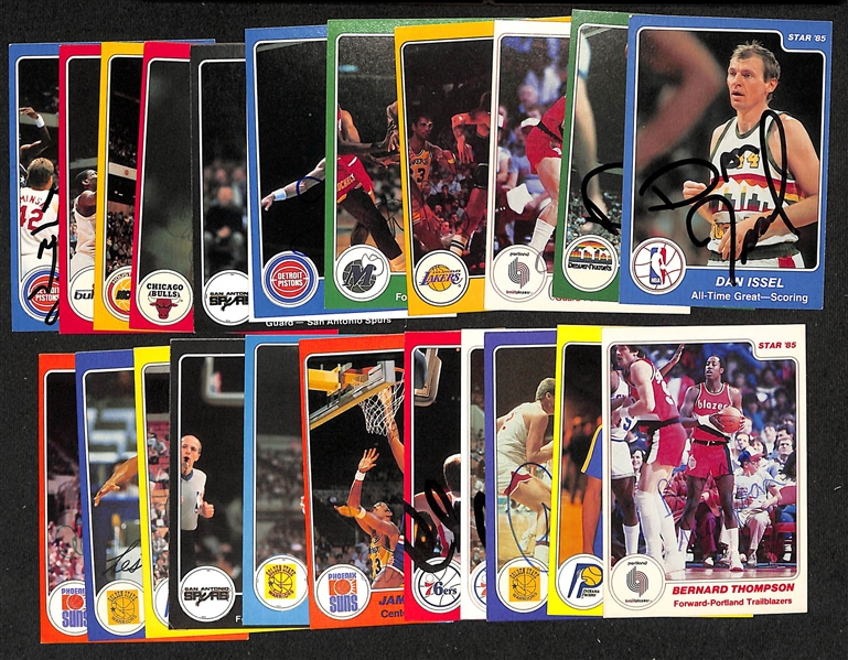 Lot of (20+) Signed 1984-85 Star Basketball Cards inc. (2) Dan Issel, Jim Paxson, Bob McAdoo, Dale Ellis, + (JSA Auction Letter)