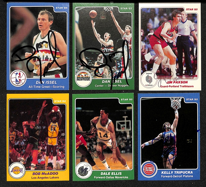 Lot of (20+) Signed 1984-85 Star Basketball Cards inc. (2) Dan Issel, Jim Paxson, Bob McAdoo, Dale Ellis, + (JSA Auction Letter)