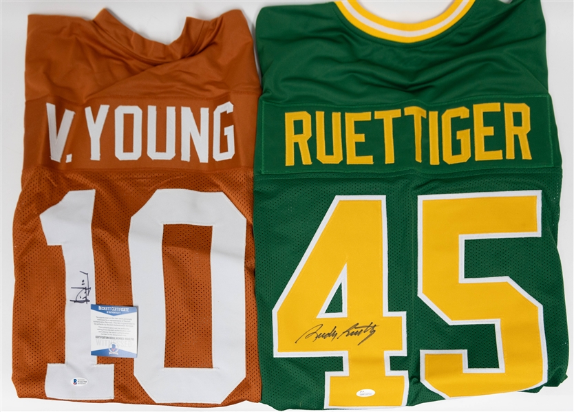 Lot of (2) Custom Autographed Custom College Football Jerseys Inc. Vince Young & Rudy Ruettiger (JSA & BAS)