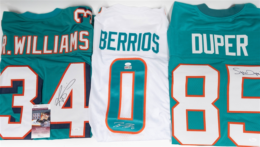 Lot of (3) Autographed Custom Miami Dolphins Football Jerseys inc. Ricky Williams, Braxton Berrios & Mark Duper (JSA)