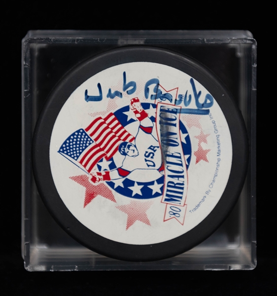 Herb Brooks Signed Miracle on Ice Hockey Puck + (JSA Auction Letter)