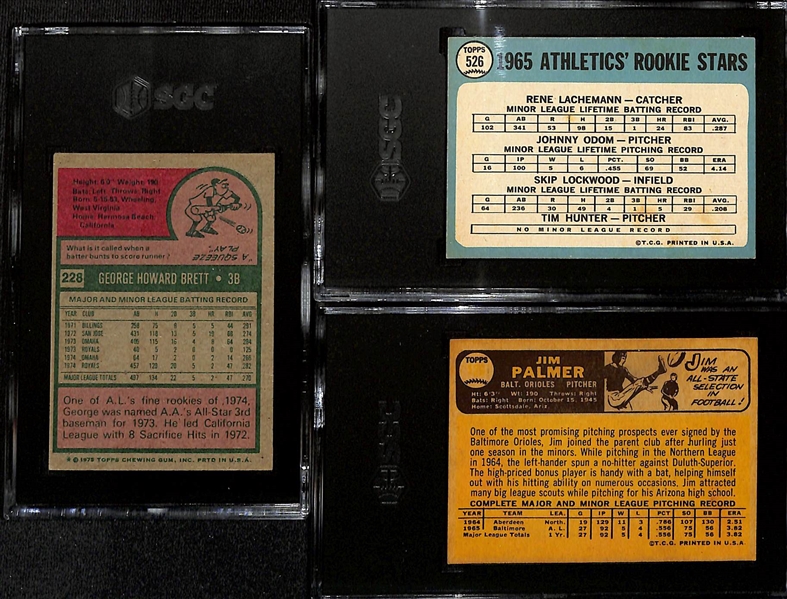 HOFer Graded Topps Rookie Card Lot - 1975 George Brett (SGC 4), 1965 Jim Catfish Hunter (SGC 4), 1966 Jim Palmer (SGC 3) 
