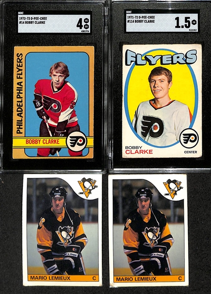 Hockey Card Lot - (2) Graded Bobby Clarke Cards (2nd and 3rd Year OPC) & (2) 1985-86 OPC Mario Lemieux Authentic Rookie Cards (Both Sealed in Permanent Plastic Contact Paper - So Unable to Grade)