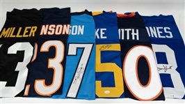 Lot of (6) Signed Custom Football Jerseys w. Daniel Jones, Rod Smith, Braden Fiske (All w. COAs)