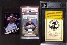 Lot of (3) Superstar Items - Leaf Metal Floyd Mayweather Jr Autograph (#7), Upper Deck Artifacts Nathan MacKinnon Jersey Patch (#/25) (PSA 7), Chuck Norris Cut Autograph (BGS Authentic)